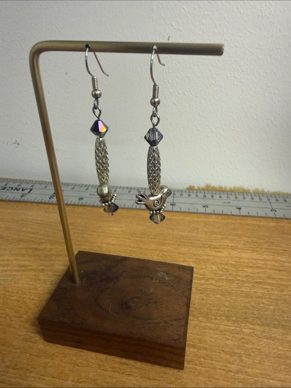 silver tone dangle drop earrings with rhinestone and bird details